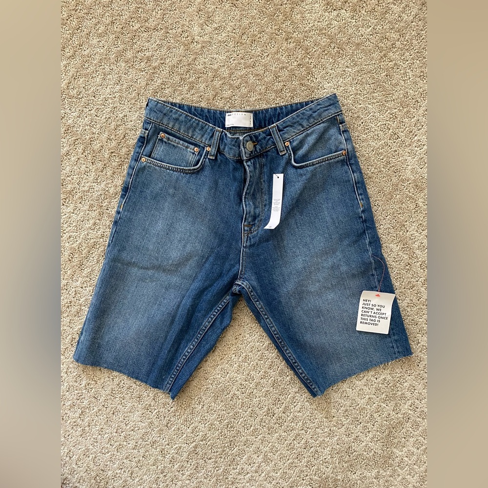 ASOS Designs denim dad short in mid wash with raw hem
